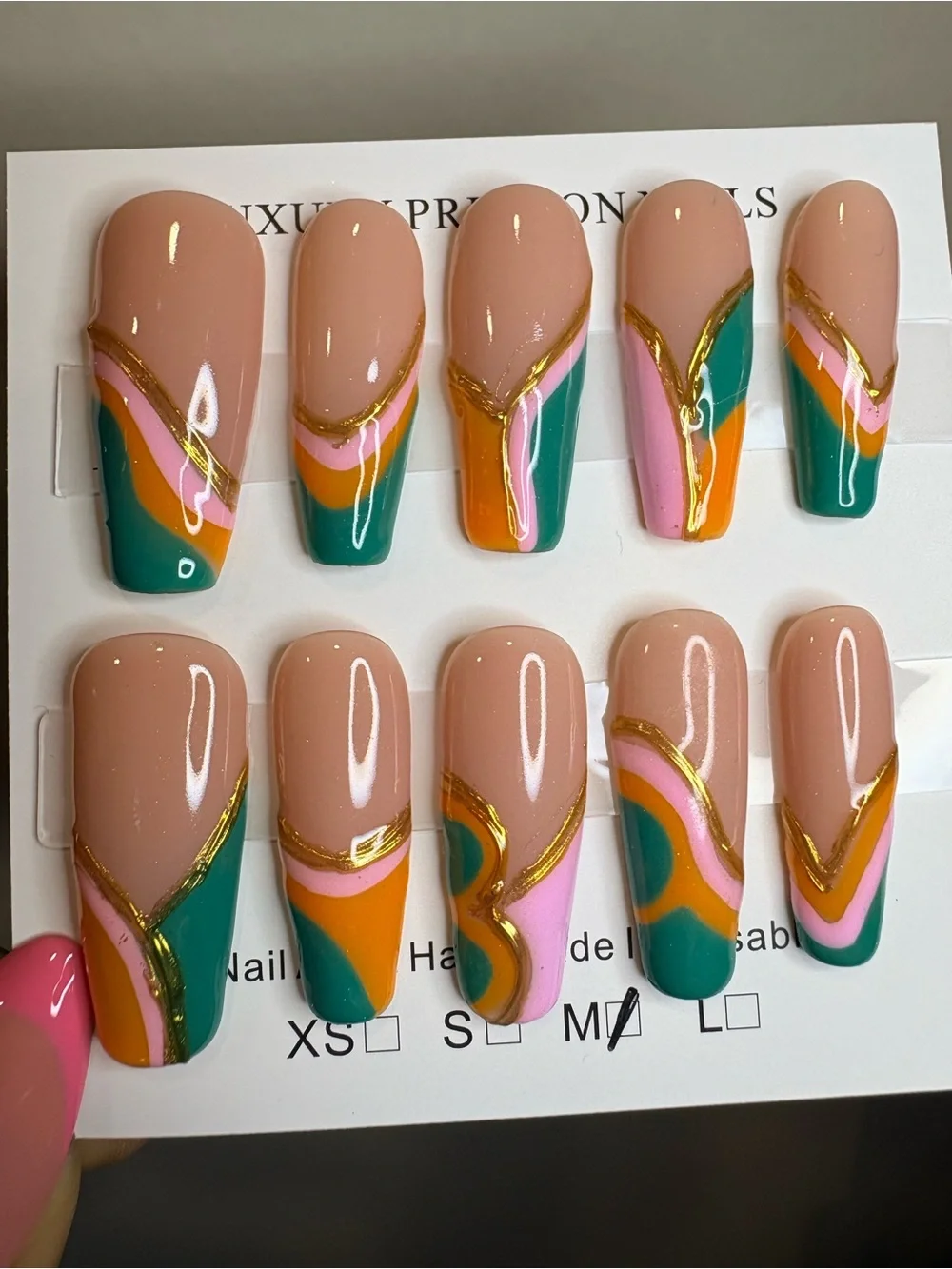 Peach French Tip Press-On Nails with Teal, Pink & yellow Swirls